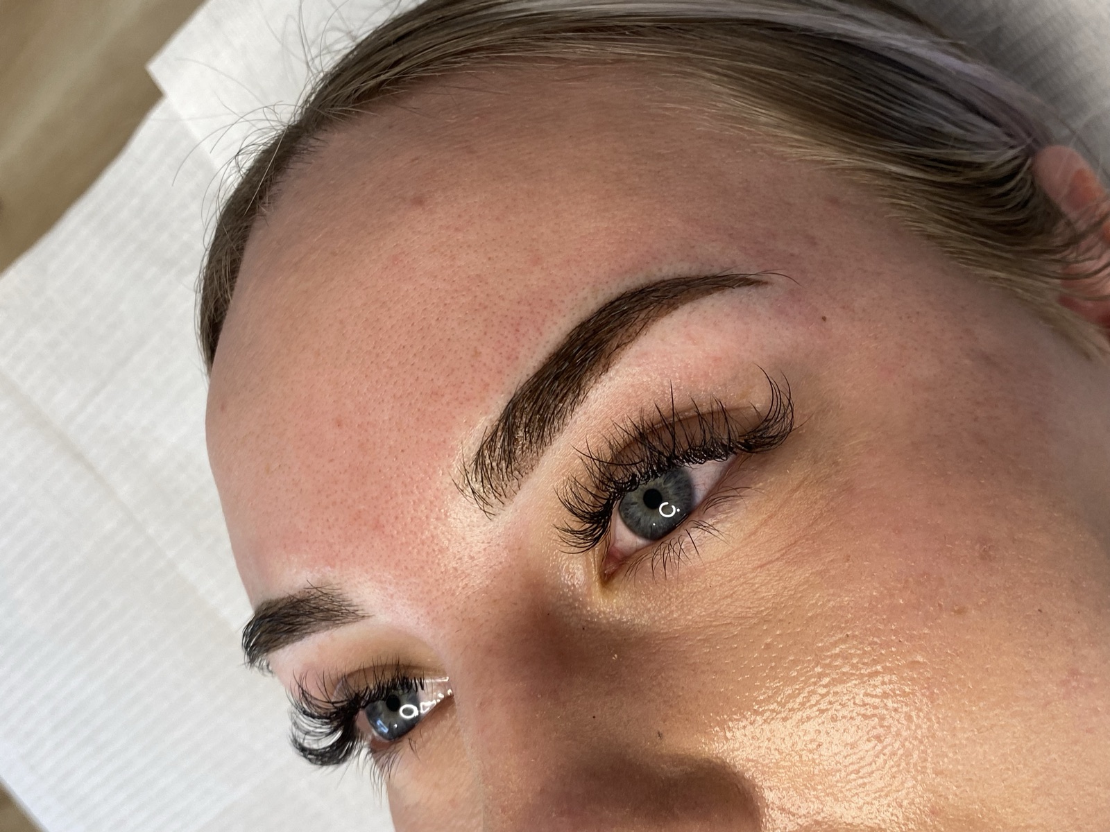 Close-up of finished natural brows
